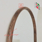 Wooden mirror with 'Canvas Guy' branding on a white background
